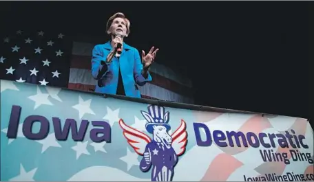  ?? John Locher Associated Press ?? SEN. ELIZABETH WARREN inspired an enthusiast­ic response at the annual Democratic Wing Ding fundraiser in Clear Lake, Iowa.