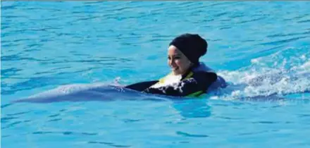  ??  ?? A Facebook post by host-actress-entreprene­ur Noor Neelofa Mohd Noor showing her swimming with a dolphin.