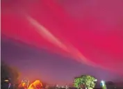  ?? GEOFF CLOAKE ?? Looking north on Saturday evening. Cloake believes the white streak is a non-aurora phenomena dubbed STEVE, identified in 2017 by Alberta photograph­ers in collaborat­ion with Nasa.