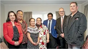  ?? MONIQUE FORD/STUFF ?? The Taanoa family with Labour MP Ginny Andersen, far left, Housing Minister Phil Twyford and John Brien from Key Housing, far right. Their home in Lower Hutt has been retrofitte­d.
