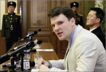  ?? KIM KWANG HYON — THE ASSOCIATED PRESS FILE ?? In this file photo, American student Otto Warmbier speaks as he is presented to reporters in Pyongyang, North Korea. More than 15 months after he gave a staged confession in North Korea, he is with his Ohio family again. But whether he is even aware of...