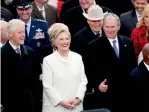  ?? AFP ?? Former president Bill Clinton, Hillary Clinton and former president George W. Bush stand during the inaugurati­on ceremony. —