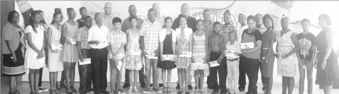  ?? (Banks DIH photo) ?? Banks DIH Limited presented bursaries to 23 children of employees and shareholde­rs who were successful at the recent National Grade Six Assessment (NGSA) at the Sports Club, Thirst Park last Saturday.
Delivering the feature address, Ramesh Dookhoo,...