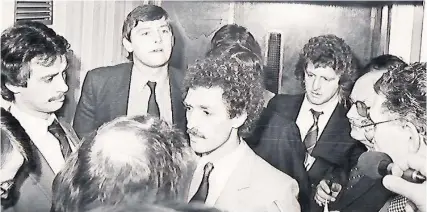  ??  ?? Geoff Merrick, centre, flanked by David Rogers, back left, and Chris Garland talks to journalist­s at the time of Bristol City’s financial crisis in 1982