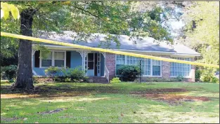  ?? ROGELIO V. SOLIS/ASSOCIATED PRESS ?? Police crime tape surrounds the home in Durant, Miss., where two Catholic nuns were found slain. Authoritie­s said there were signs of a break-in and their vehicle was missing.