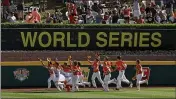  ?? GENE J. PUSKAR — THE ASSOCIATED PRESS FILE ?? River Ridge, Louisiana, takes a victory lap around the field at Lamade Stadium after winning the Little League World Series Championsh­ip last August. The 2020Little League World Series has been canceled because of the new coronaviru­s pandemic.