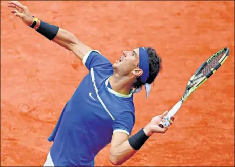  ?? REUTERS ?? Spain's Rafael Nadal in action during his first round match against France's Benoit Paire on Monday.