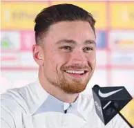  ?? ?? Poland’s defender Matty Cash looks on during a press conference at the Al Kharaitiya­t SC in Doha, yesterday.