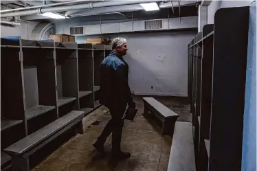  ?? Photos by Carlos Avila Gonzalez/The Chronicle ?? Project manager Dan Mauer walks through the locker room once used by the 49ers when they played in Kezar Stadium. The venue in Golden Gate Park is about to undergo a major renovation before it turns 100.
