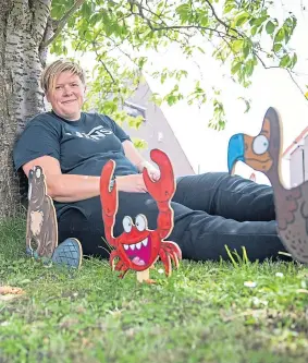  ??  ?? Clare with a beaver, crab and dodo.