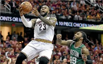  ?? PHOTO: USA TODAY SPORTS ?? Cleveland Cavaliers forward LeBron James (23) drives to the basket against Boston Celtics forward Jae Crowder.