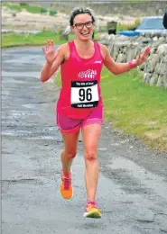  ?? 01_B28maratho­n11 ?? Jagoda Penkala of Arbroath is all smiles as she finishes.