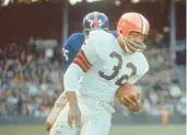  ?? AP ?? Jim Brown played in the NFL from 1957-65, and some consider him the best to ever play the game. He ran for 12,312 yards and scored 126 touchdowns in those nine seasons.