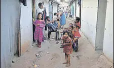  ?? REUTERS FILE ?? Rohingya refugees outside makeshift houses on the outskirts of Jammu. Thursday will mark the first official deportatio­n of Rohingya refugees from India to Myanmar.