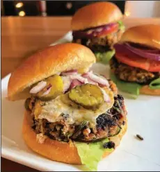  ?? (Pittsburgh Post-Gazette/TNS/Gretchen McKay) ?? Roasted black beans and toasted cashews team up with chipotle in adobo to create this really awesome veggie burger.