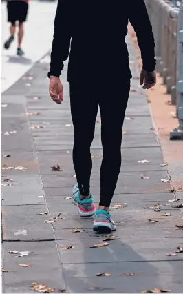  ?? GABRIELA BHASKAR/THE NEW YORK TIMES ?? If almost all of us started walking for an extra 10 minutes a day, we could, collective­ly, prevent
more than 111,000 deaths every year, a study says.