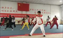  ?? YANG YANG / CHINA DAILY ?? A martial arts training program is offered by the Tianjin Huo Yuanjia Civil and Military School for