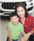  ??  ?? Seven-year-old Wen Han Cai needn’t lust for a Ferrari-engined Maserati Levante SUV as mother Maggie Guo already has one on order.