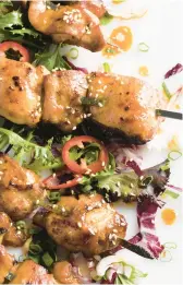  ?? MILKSTREET ?? These savory-sweet chicken skewers from the book “Cookish,”which limits recipes to just six ingredient­s without sacrificin­g flavor, are loosely based on Japanese yakitori.