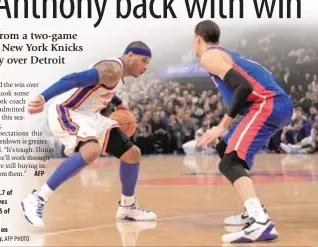  ?? AFP PHOTO
AFP ?? Carmelo Anthony No.7 of the New York Knicks drives against Austin Daye No. 5 of the Detroit Pistons at Madison Square Garden on Tuesday in New York City.