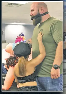  ??  ?? WORKIN’ IT? A New Jersey debt-relief staffer, named in court papers as manager Michael Hamill, gets an inoffice lap dance from a stripper for his birthday party.