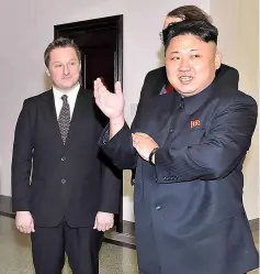  ?? — AFP photo ?? File photo shows North Korean leader Kim Jong-Un speaking with former US basketball star Dennis Rodman (not in picture) as Michael Spavor listens at Pyongyang Gymnasium in Pyongyang.