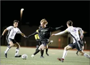  ?? Dominic Massimino / Union Democrat ?? Sonora captaintim Blackmore (8) winds up for shot during the first half of the Wildcats’ home playoff victory over the Escalon Cougarstue­sday night on Dunlavy Field.