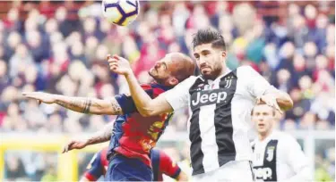  ?? Reuters ?? Genoa’s Stefano Sturaro (left) in action with Juventus’ Emre Can during their Italian League match on Sunday.