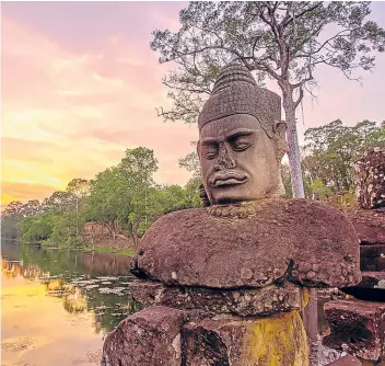  ??  ?? ▼ Cambodia’s Angkor Wat complex is the largest religious monument in the world.