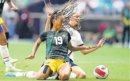  ?? AP ?? Jamaica’s Tiernny Wiltshire (front) and United States’ Sophia Smith fight for the ball during their Concacaf Women’s Championsh­ip match in Monterrey, Mexico, on Thursday.