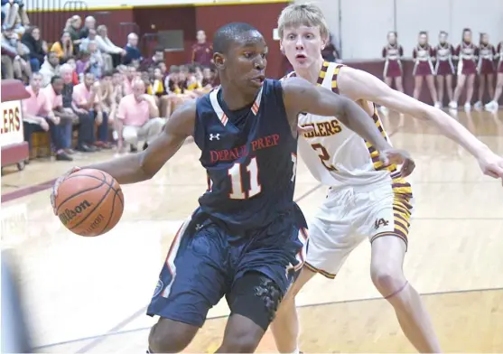  ?? | WORSOM ROBINSON/ FOR THE SUN- TIMES ?? DePaul Prep junior Perry Cowan is averaging 18.5 points this season, but he is averaging 21.8 points in his last five games.