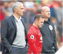  ??  ?? Jose Mourinho and Wayne Rooney yesterday.