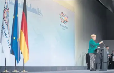  ?? AP ?? German Chancellor Angela Merkel speaks to the media during her closing news conference at the G20 summit on Saturday in Hamburg, Germany.