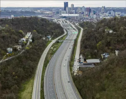  ?? Andrew Rush/Pittsburgh Post-Gazette via AP ?? Traffic moves on the Parkway North.