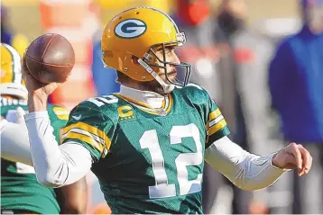  ?? JEFFREY PHELPS/ASSOCIATED PRESS ?? Green Bay quarterbac­k Aaron Rodgers, who led the league with 48 TD throws in the regular season and guided the Packers to a 13-3 record, was named the league MVP at NFL Honors on Saturday night.