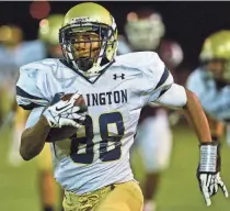  ?? ?? Aug. 30, 2013: Arlington High's Jake Eisenbraun finds room to run through the Colliervil­le defense.