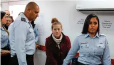  ?? AFP ?? Ahed Al Tamimi being hauled before an Israeli military court