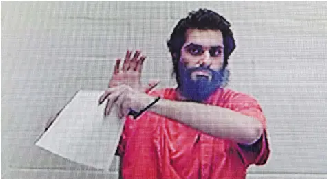  ?? COLIN PERKELT/The Canadian Press ?? Jahanzeb Malik appeared via videolink from prison in Lindsay, Ont., at his Immigratio­n and Refugee Board admissibil­ity hearing last May. Malik was
arrested in March for allegedly plotting a suicide bombing in downtown Toronto.