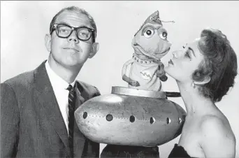  ??  ?? A COMEDY STAR OF THE 1950S Stan Freberg, with Diane Parry in a publicity photo, worked with animator Bob Clampett on the popular
1950s TV show “Time for Beany” in which Freberg did the voice of Cecil the Seasick Sea Serpent.