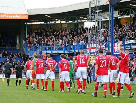  ?? ?? Bath City players emerge to a 7,000 plus crowd at Kenilworth Road back in 2010