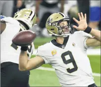  ?? JOSE JUAREZ — THE ASSOCIATED PRESS ?? New Orleans Saints quarterbac­k Drew Brees throws during the first half of an NFL football game against the Detroit Lions, Sunday, in Detroit.