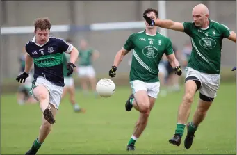  ??  ?? Mark Lennon of Bray Emmets is chased by Avondale’s Barry Sheehan.