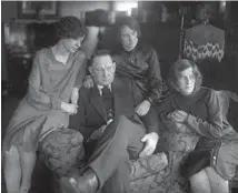  ?? CHICAGO HERALD AND EXAMINER ?? Sgt. Anthony McSwiggin, father of slain Assistant State’s Attorney William H. McSwiggin, is seen with his daughters Mary, from left, Emily and Margaret in April 1926.