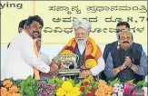  ?? ANI/PIB ?? Prime Minister Narendra Modi lays foundation stone and dedicates developmen­t projects in Yadgiri on Thursday.