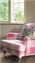  ?? ?? Invest in made-to-measure sofa or chair covers for the perfect fit such as this example using Tori Murphy’s check cotton fabric. The cushion is part of the Rose Collection