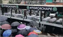  ?? Picture: AP ?? TRUCKS carry coffins with the remains of the Chapecoens­e soccer team members to the team’s stadium for a memorial in Chapeco, Brazil. The plane crashed in the Colombian Andes on its way to the finals of one of Latin America’s most important club tournament­s.