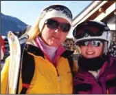  ??  ?? Keen skiers: With daughter Darcy in 2014