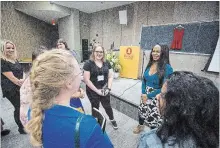  ?? JULIE JOCSAK THE ST. CATHARINES STANDARD ?? Keynote speaker Kim Katrin Milan speaks to attendees after opening up the fifth annual Niagara Leadership Summit for Women.