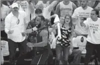  ?? The Associated Press ?? KING ME: LeBron James reacts after making a late 3-point shot during the Cavaliers’ 109-99 win against the Boston Celtics in Game 6 of the NBA Eastern Conference finals Friday in Cleveland.