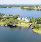  ?? SOTHEBY’S INTERNATIO­NAL REALTY/COURTESY PREMIER ?? In September, this 10-bedroom, 13,855-square-foot estate on the shore of Lake Virginia sold for $10.65 million.